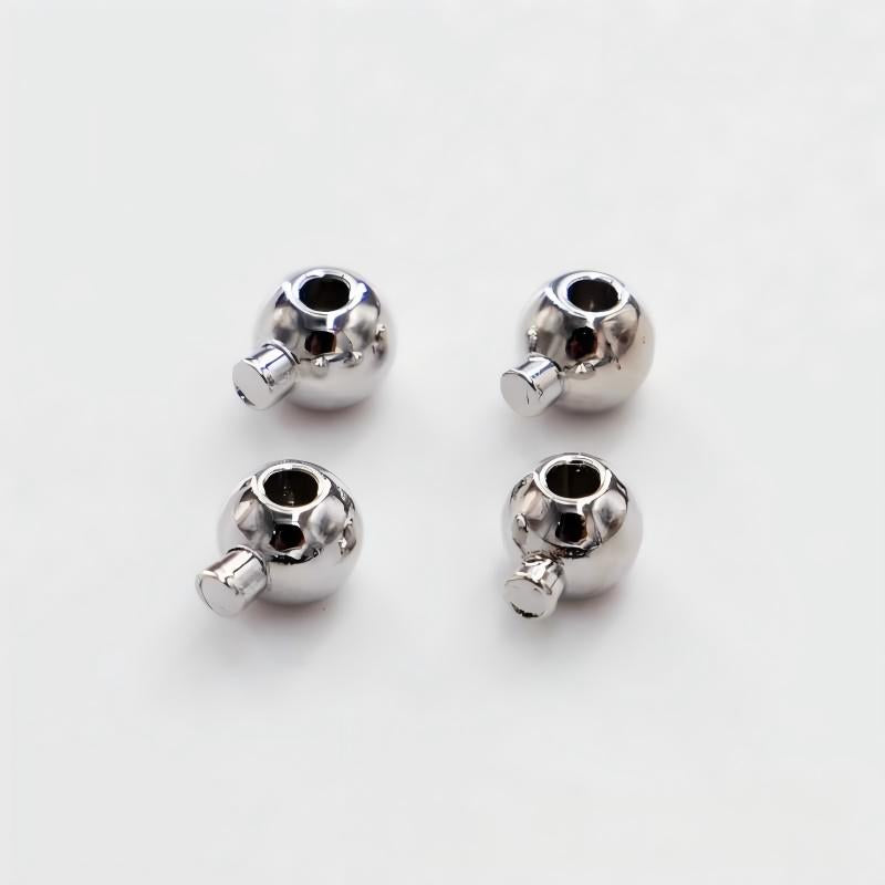 Color-preserving plated  positioning bead and buckle pressure clip