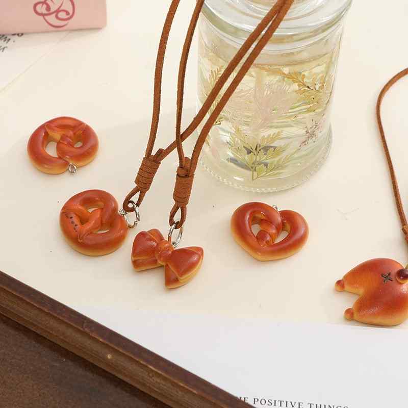 Nail simulation food toy stick alkaline water bread resin DIY necklace baby bag mobile phone chain bag hanging decoration 